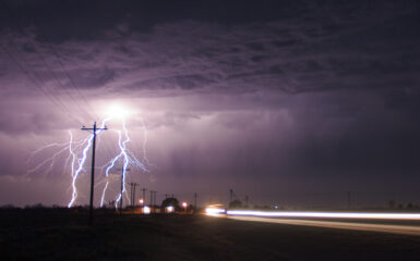 Lightning next to the highway