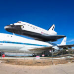 The 747 that carried the space shuttle cross country and the Independence mock up on the back