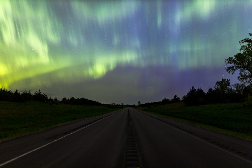 Northern Lights over a highway in South Dakota