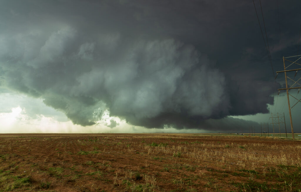 Wall Cloud with rotating dust underneath west of Meadow Texas